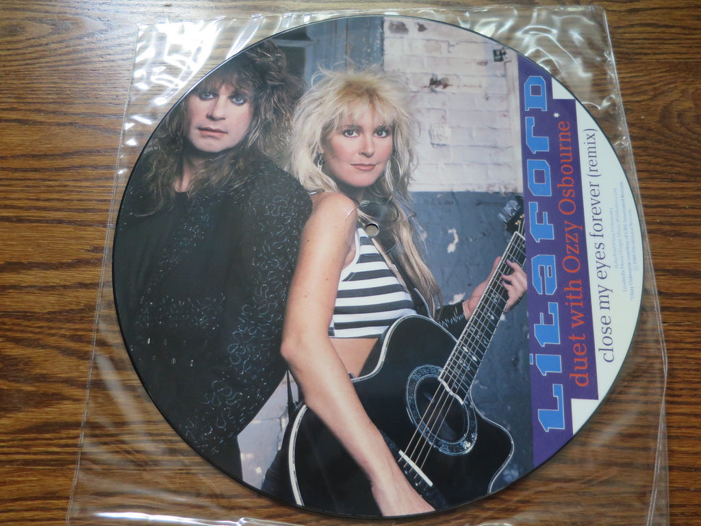 Lita Ford - Four UK 12" singles - LP UK Vinyl Album Record Cover